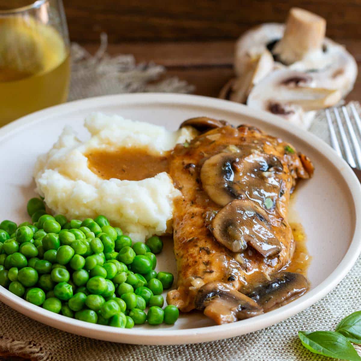 Served up mashed potatoes with the mushroom brandy sauce and peas.