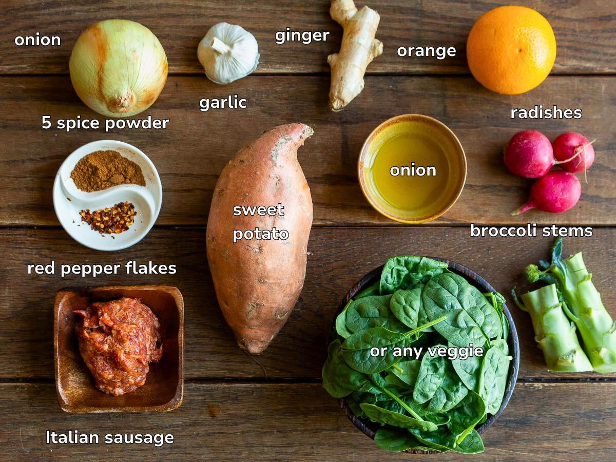 Ingredients to make an easy Chinese stir fry laid out on a wooden table. 