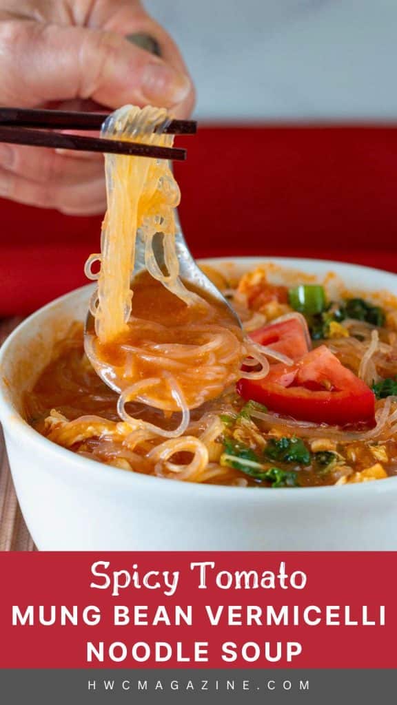 Using chopsticks to nestle cellophane noodles on a Chinese soup spoon.