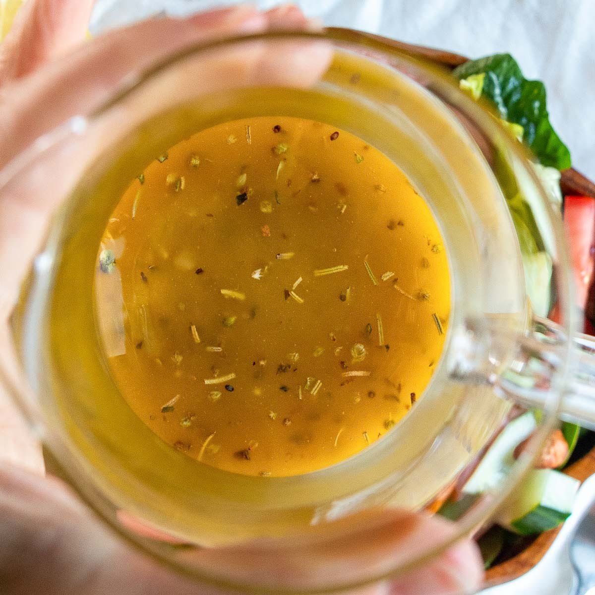 Lemon white balsamic vinaigrette in a clear glass bowl.