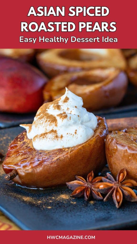 Asian spiced baked pears on a black plate topped with coconut whipped topping.